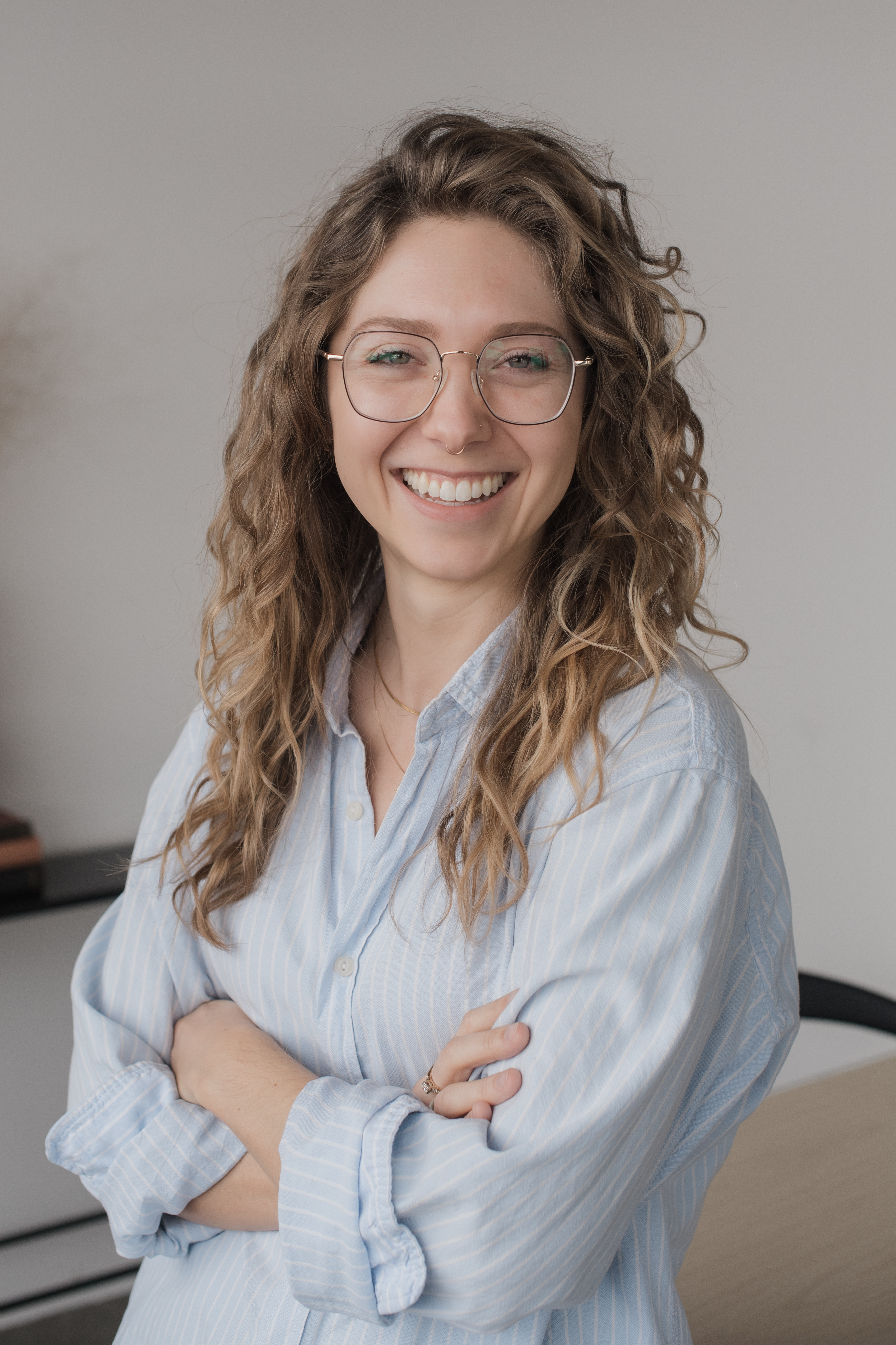 Courtney Redman seated in a calm office setting